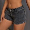 1788159048112494.jpg 65563 Women's 11 OZ Y2K Stretch Silver Metal Studs Raw Hem Denim Shorts